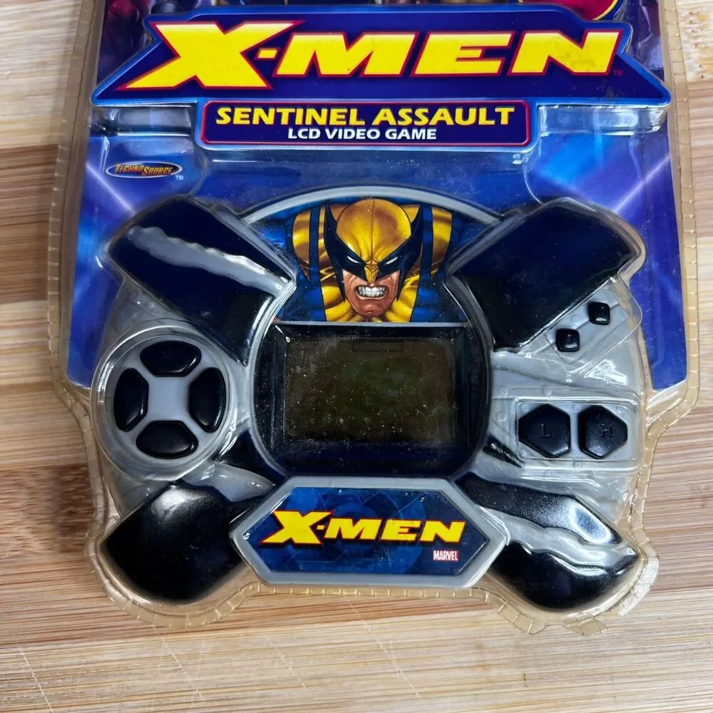 Marvel X-Men Sentinel Assault LCD Handheld Video Game 2005 Wolverine Deadpool